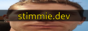 stimmie.dev 88x31 button with a goofy meme face